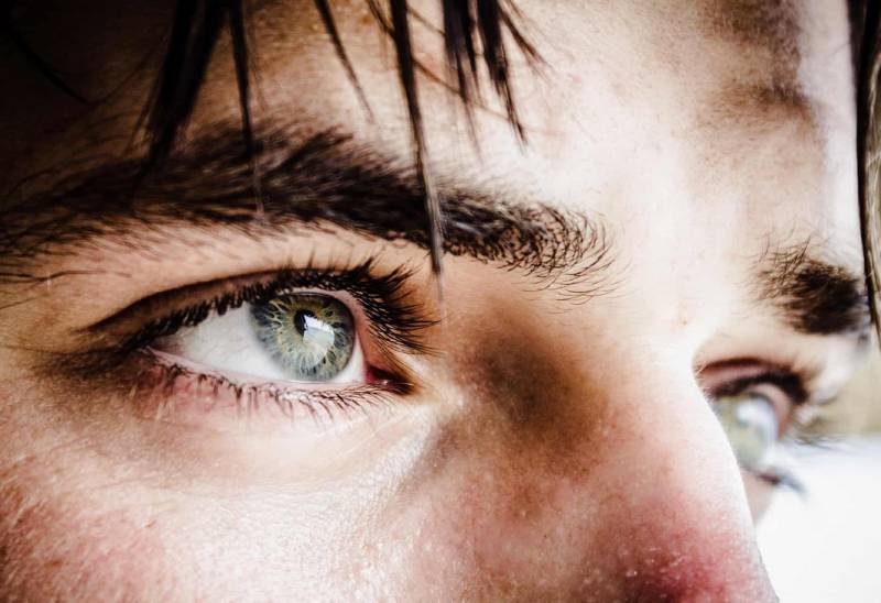 närbild foto av människans blå ögon