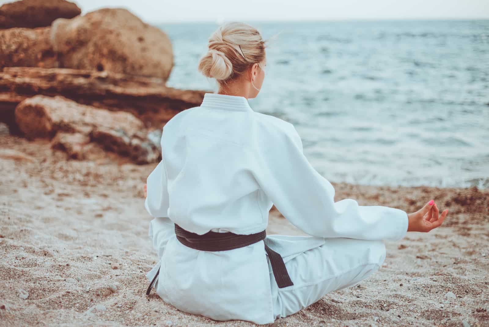 attractive karate woman in white kimono