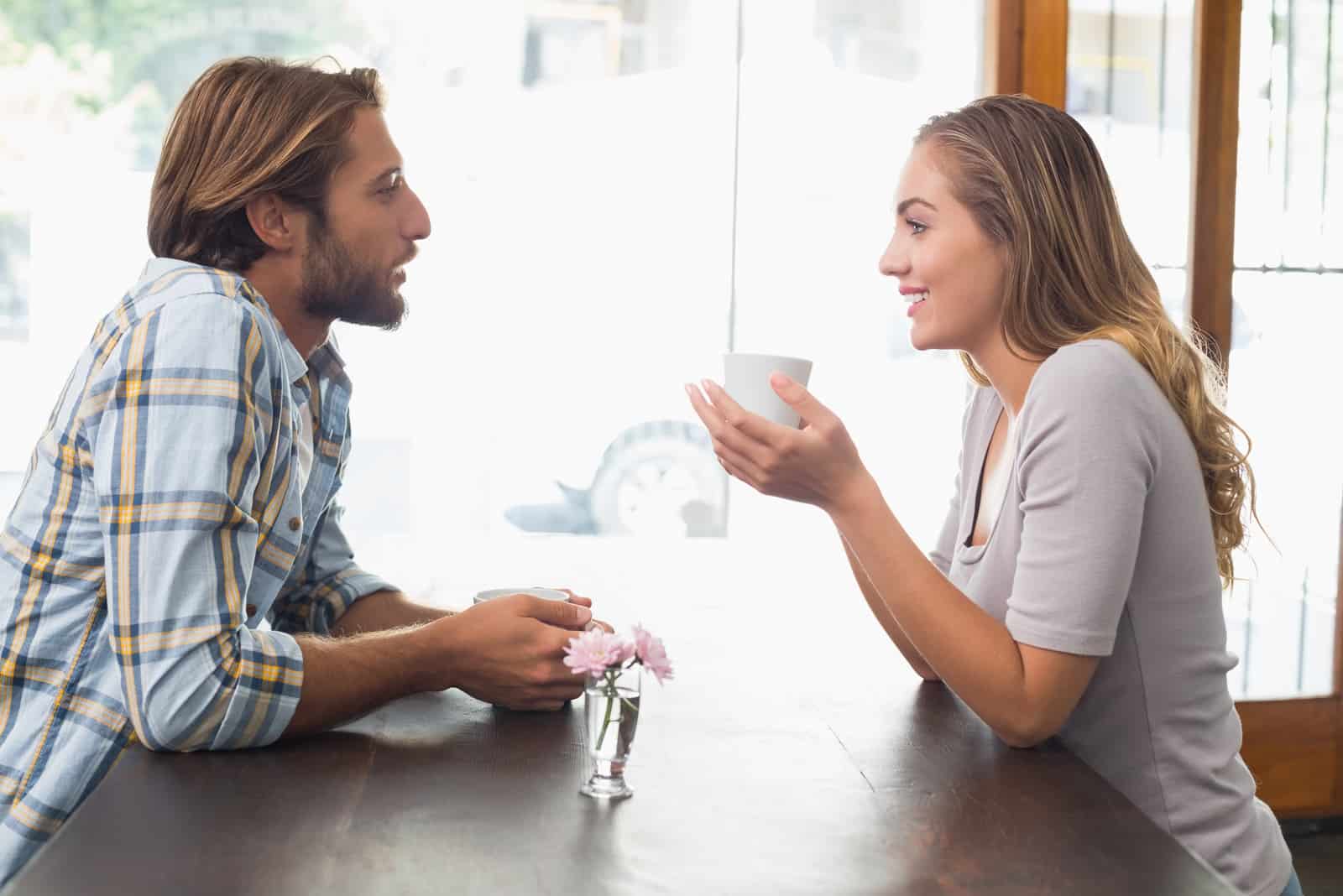 couple enjoying a coffee at the coffee shop