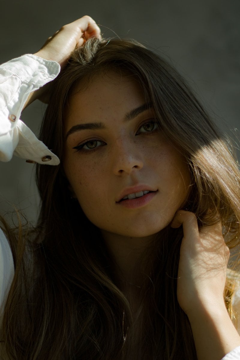 Portrait of a Woman with Soft Sunlight &middot; Free Stock Photo