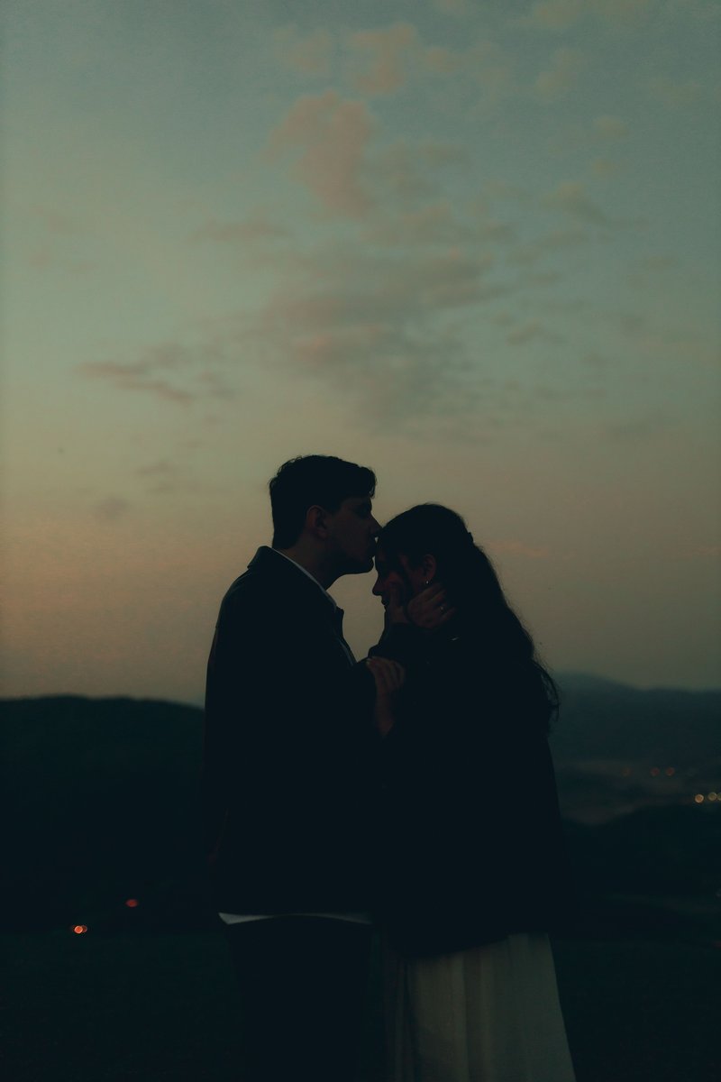 Romantic Couple Embracing at Twilight &middot; Free Stock Photo