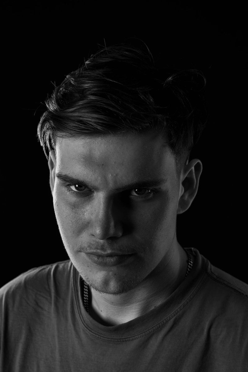 A man with a serious look on his face photo &ndash; Free Black background Image  on Unsplash