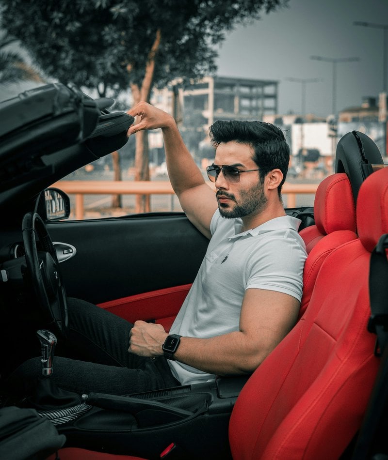 A stylish man sits in a convertible car. photo &ndash; Free Fashion Image on  Unsplash
