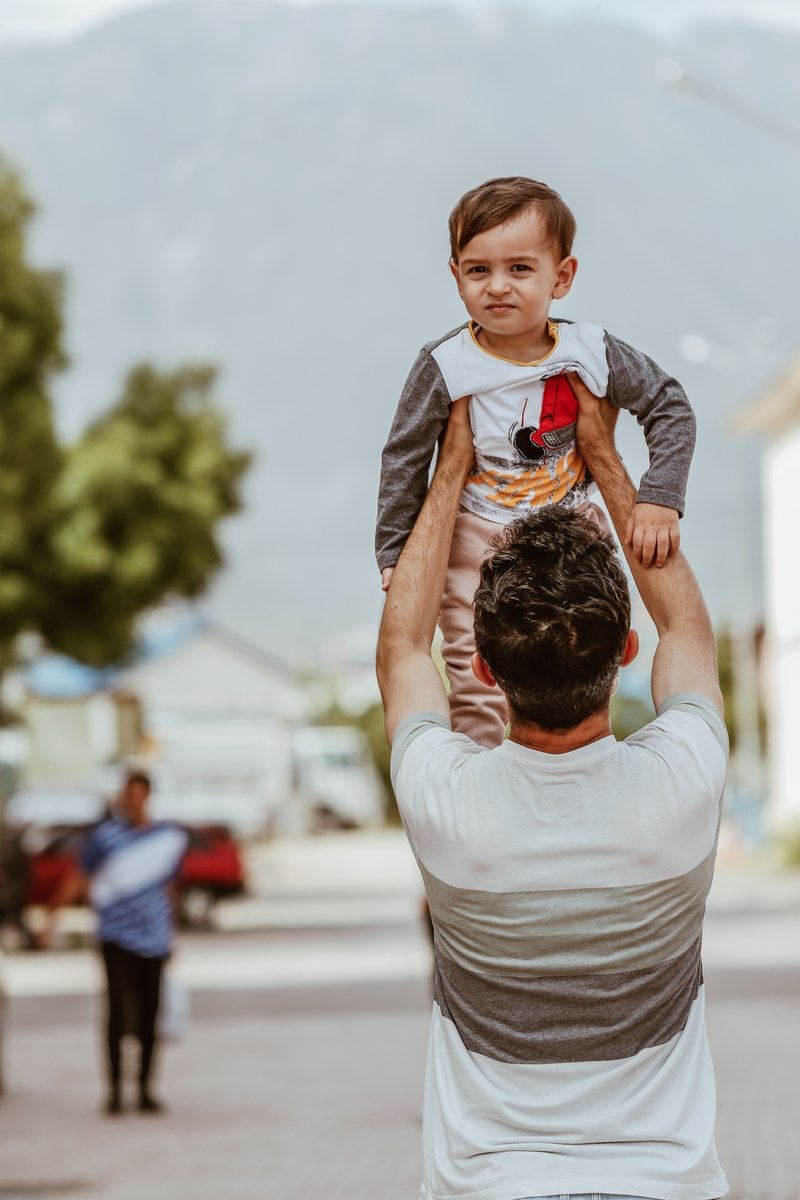 Father Lifting Up His Little Son &middot; Free Stock Photo