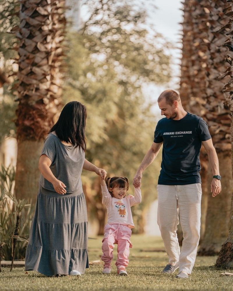 Happy Family Enjoying a Day in the Park &middot; Free Stock Photo