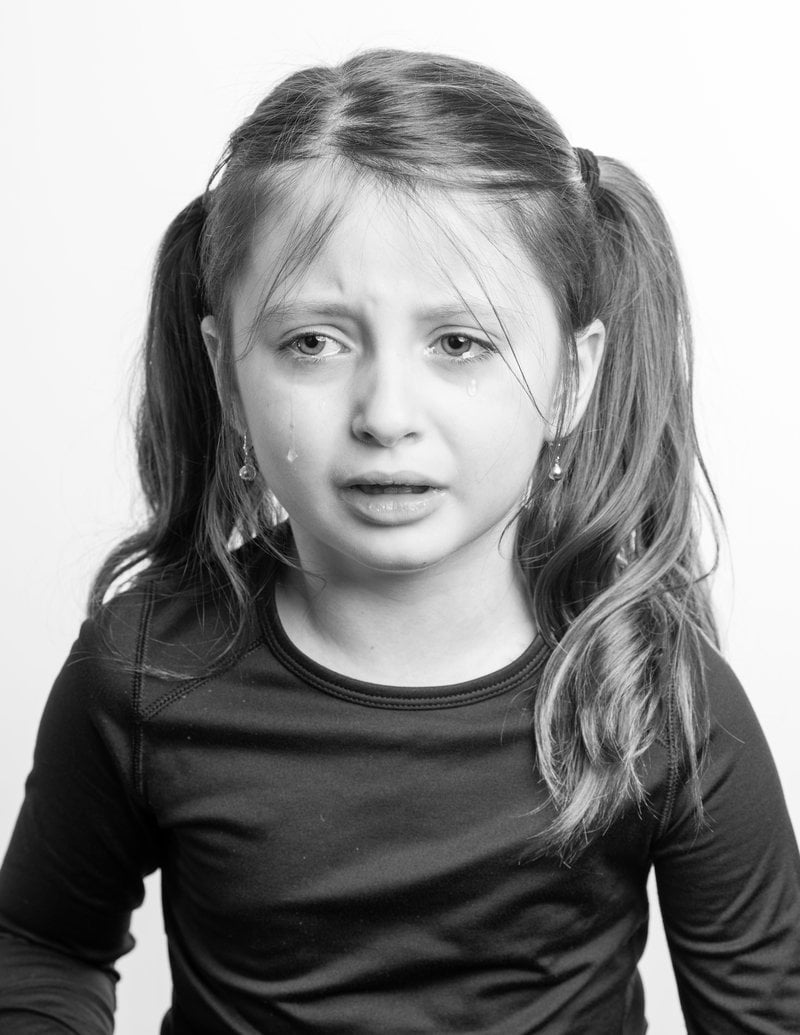 Little girl crying against white background &middot; Free Stock Photo