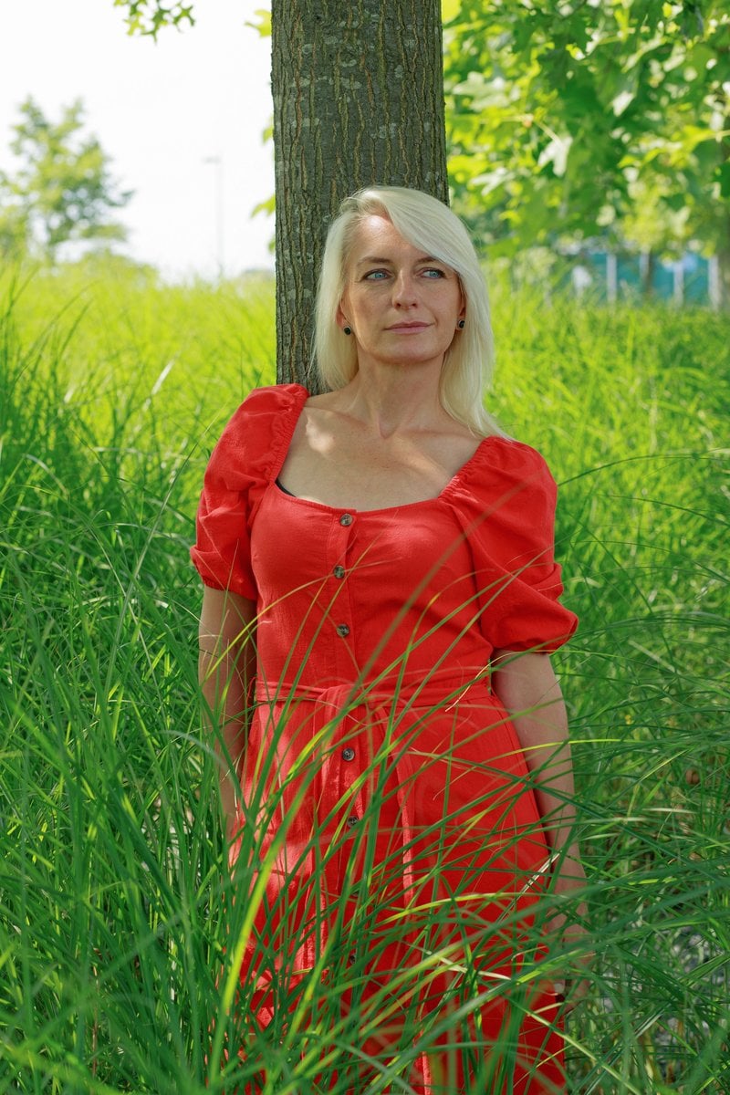 Mature Woman Standing Under the Tree &middot; Free Stock Photo