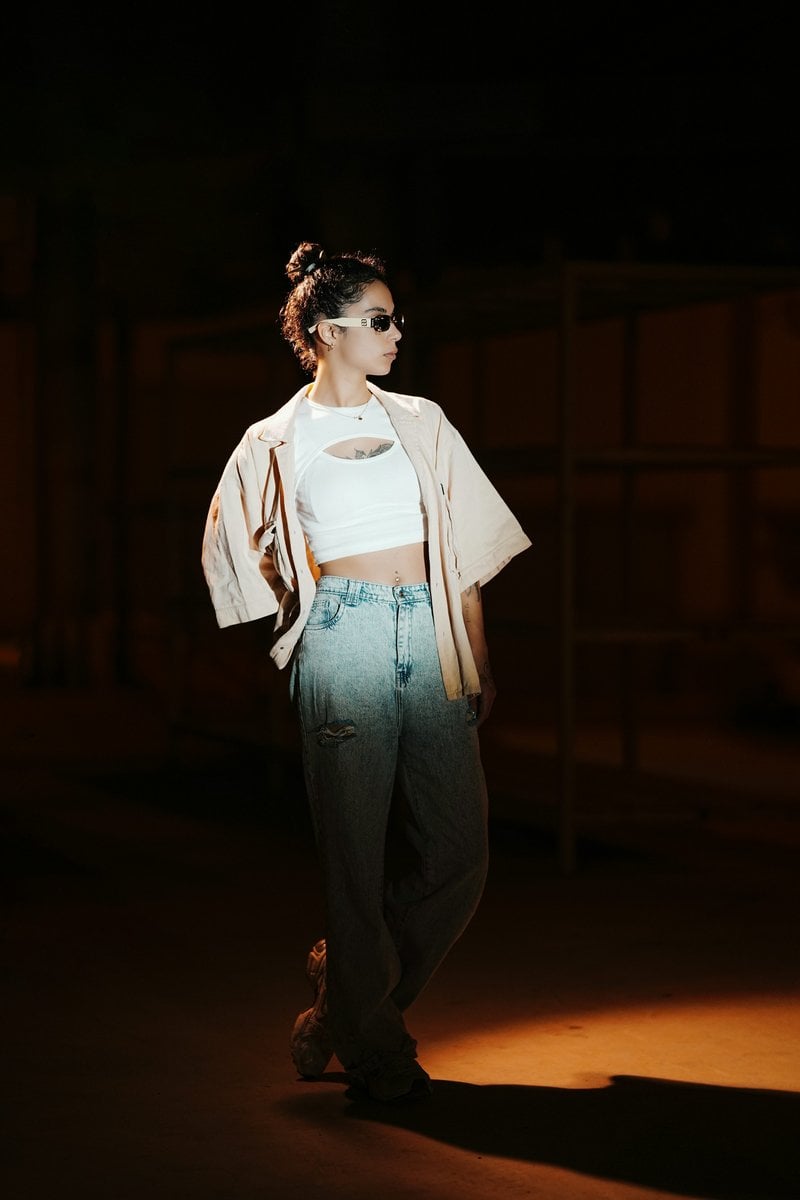 Woman in stylish outfit posing in dim lighting photo &ndash; Free Green Image on  Unsplash