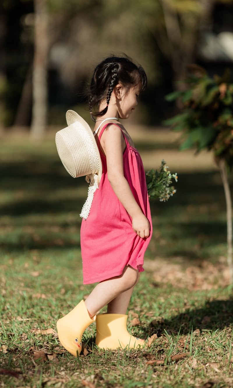 Cute Child in Pink Dress Outdoors in Kon Tum &middot; Free Stock Photo