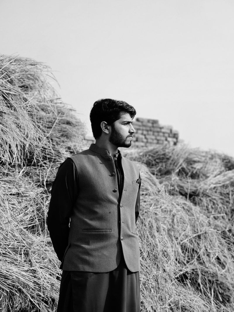 Elegant Man in Traditional Shalwar Kameez Outdoors &middot; Free Stock Photo