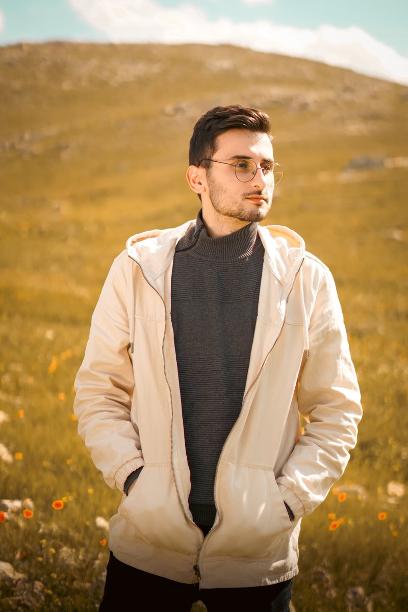 Fashionable Man in Scenic Nature Setting &middot; Free Stock Photo