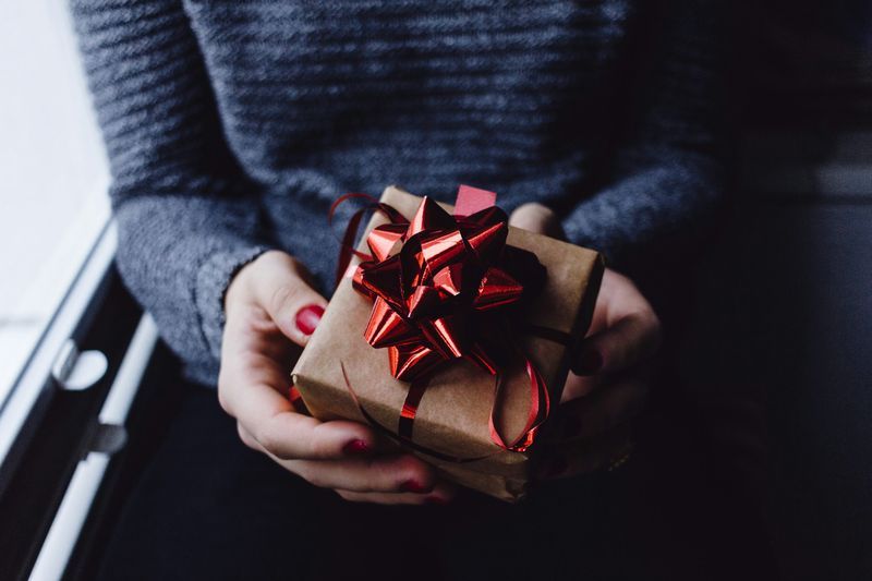 He Holds Onto Memories or Gifts