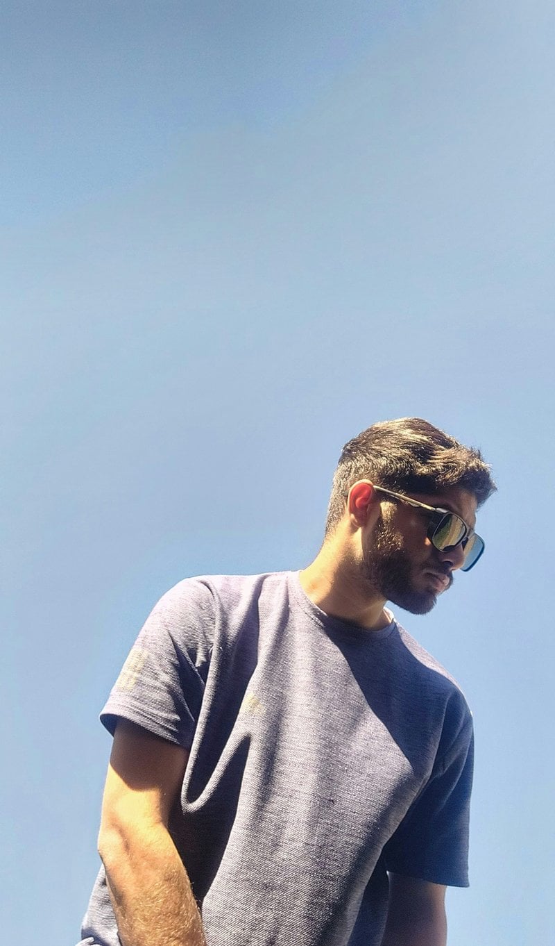 Man with blonde hair and glasses by a lake - Free Photo on ...