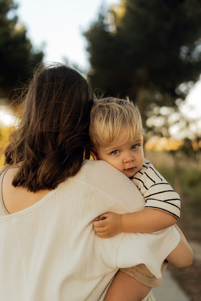 A woman holding a baby in her arms photo &ndash; Free Image on ...