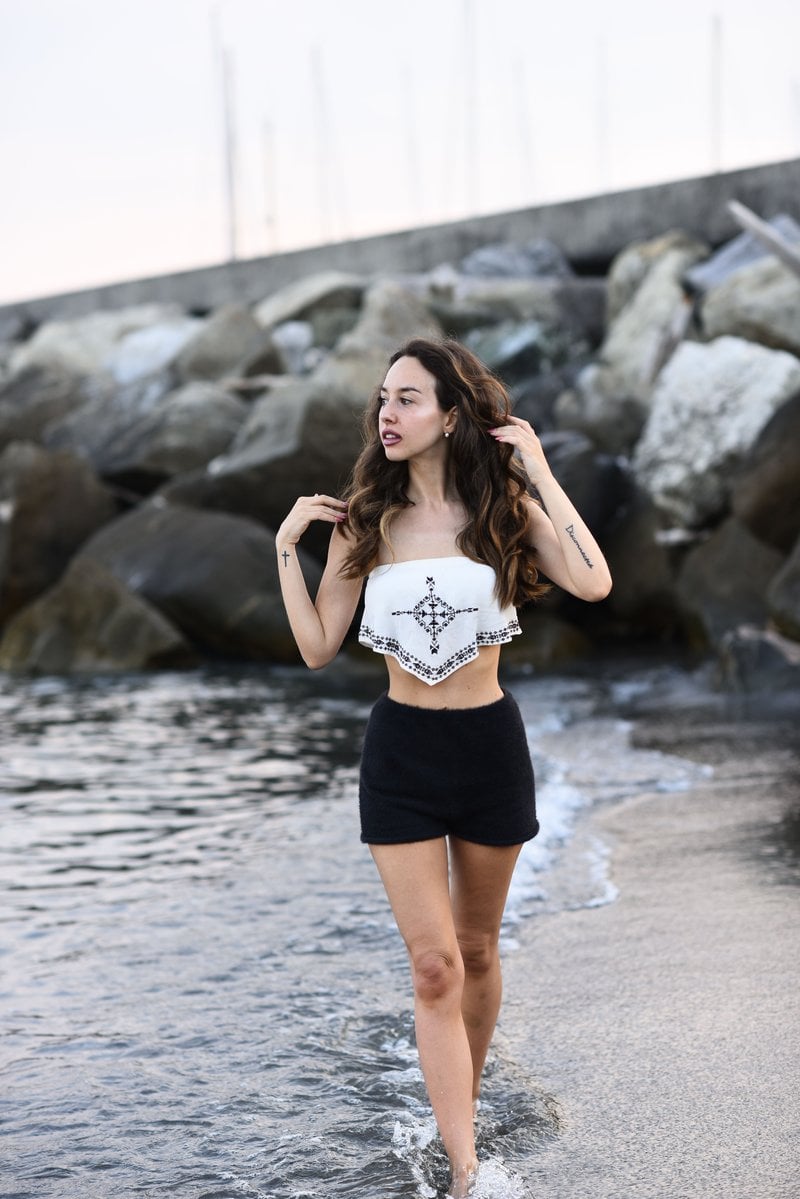 Woman Posing on Sea Shore &middot; Free Stock Photo