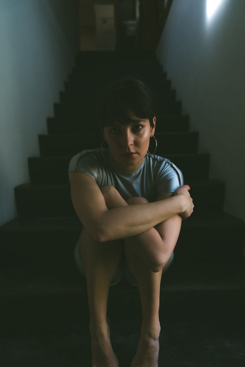 Woman Sitting on the Steps &middot; Free Stock Photo