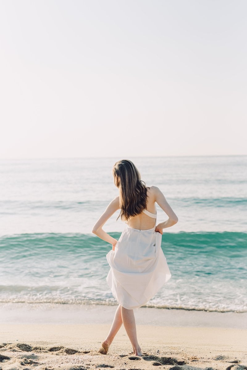 Woman in White Dress Posing at a Beach &middot; Free Stock Photo