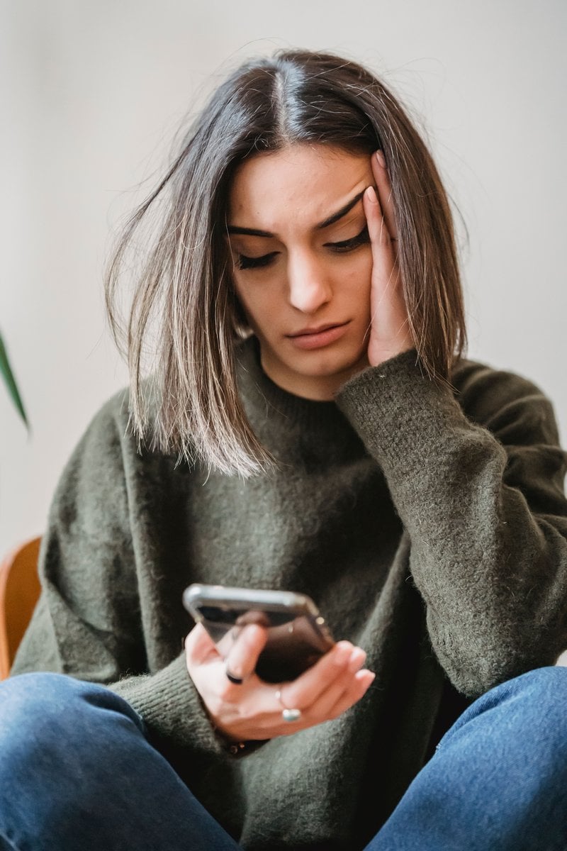 Worried Woman Sitting in Waiting Room &middot; Free Stock Photo